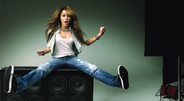 0401-miley-cyrus-on-speakers_aw